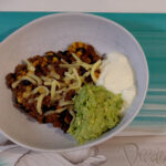 Mexican Chilli Beef Bowl, with sour cream and guacamole