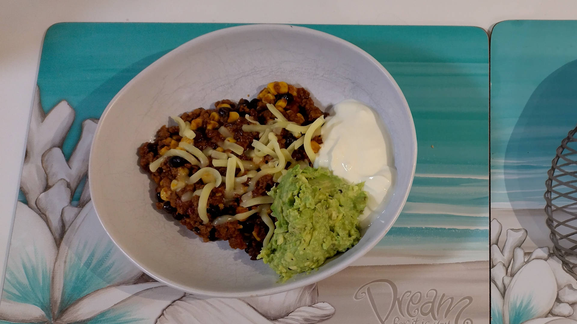 Mexican Chilli Beef Bowl, with sour cream and guacamole